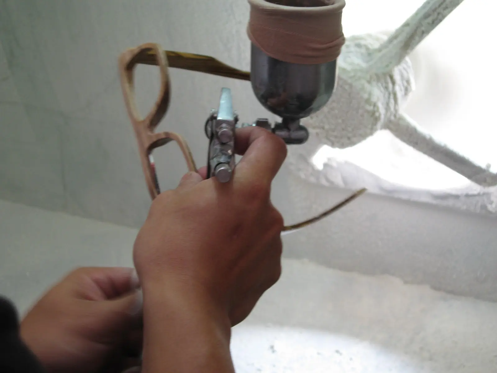 Applying the colour finish to a BRIL wooden frame